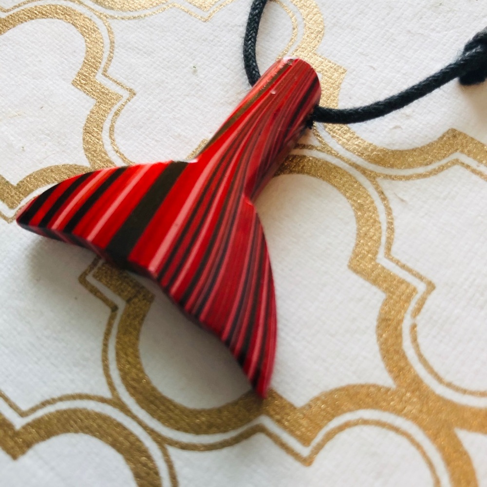 Whale tail necklace